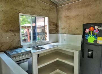 FOTOGRAFÍA MEJORAMIENTO DE VIVIENDA EN COCINA