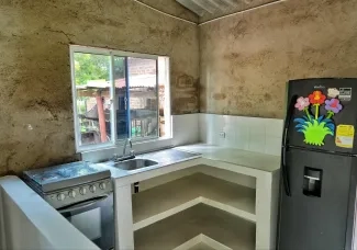 FOTOGRAFÍA MEJORAMIENTO DE VIVIENDA EN COCINA