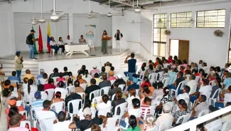 FOTOGRAFIA ENTREGA de títulos prediales en Corozal 